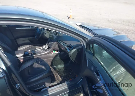 2015 Ford Fusion Titanium z USA, uszkodzony, nr VIN 3FA6P0K9XFR116015